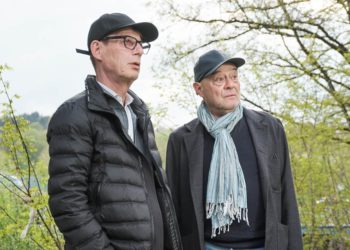 Zwei Herren am Strand
